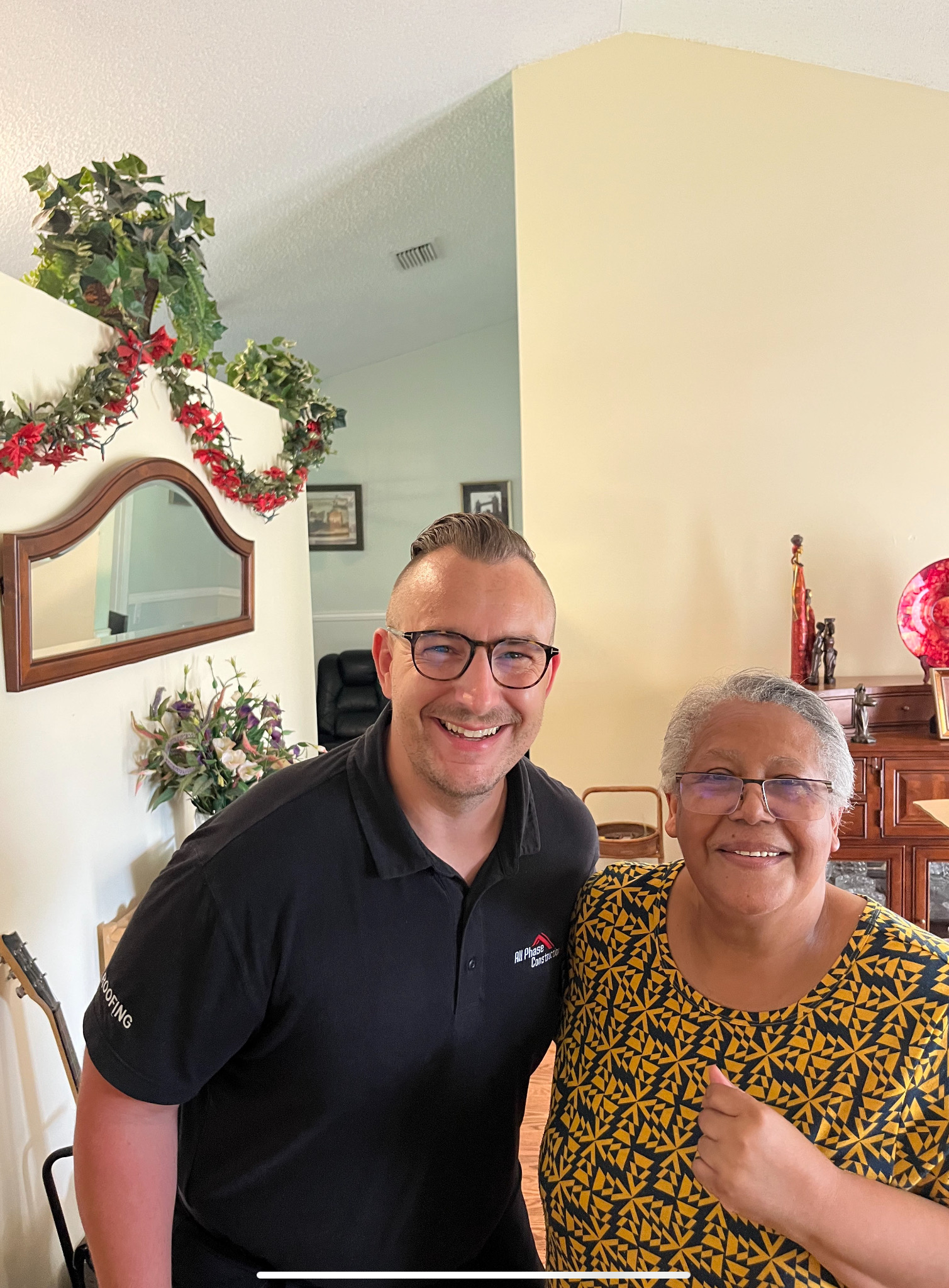 Happy homeowner after roof replacement in South Florida