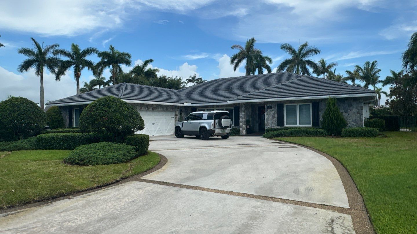 Completed tile roof installation on South Florida luxury home with proper curb appeal and hurricane protection