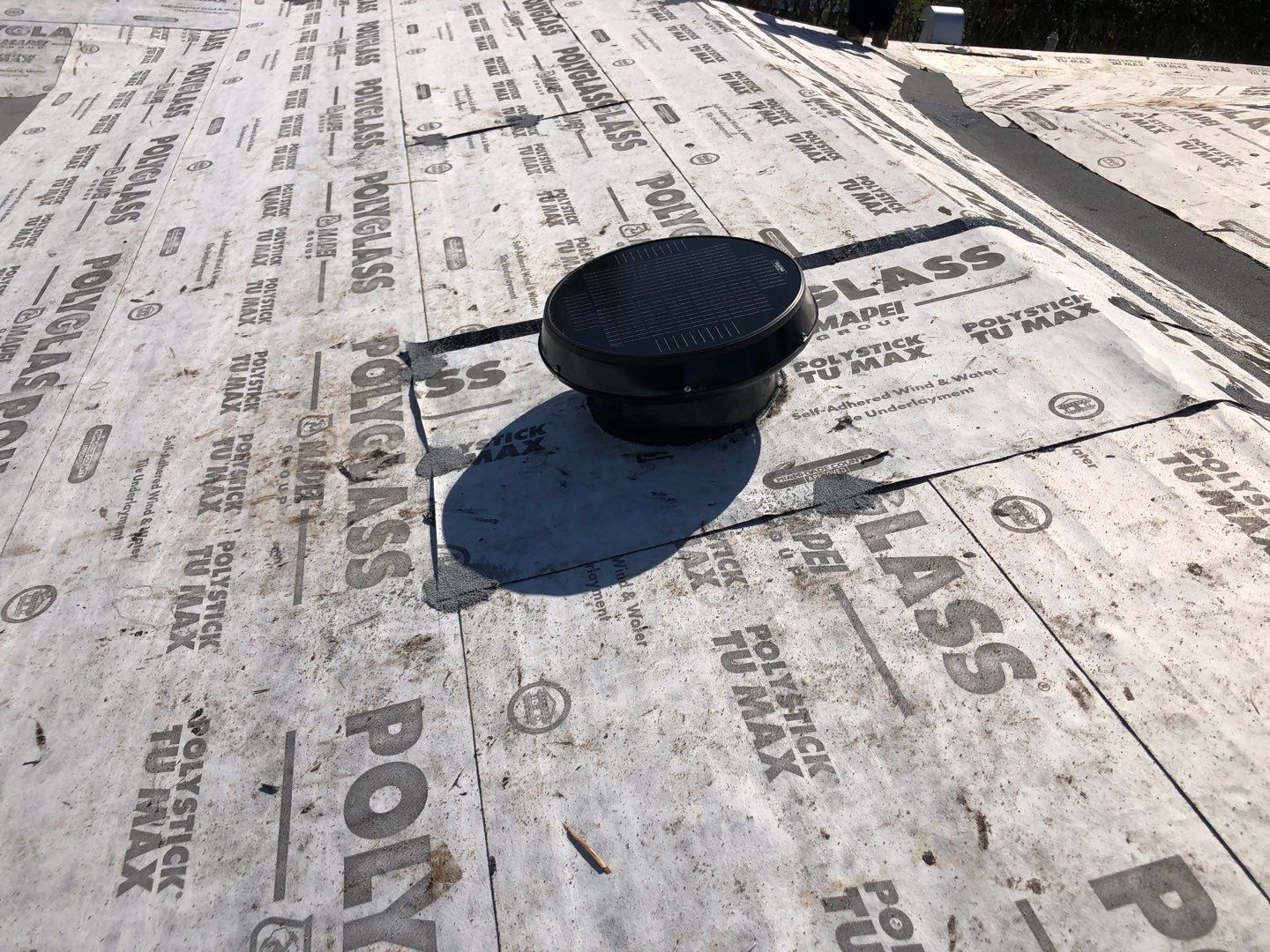 HVHZ-rated solar attic fan installation in South Florida showing proper flashing and underlayment protection