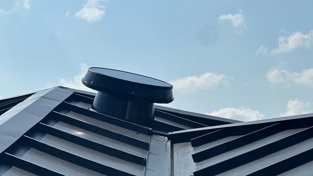 ClimaSense RM 2400 solar attic fan installed by All Phase Construction USA, shown on another completed South Florida roof