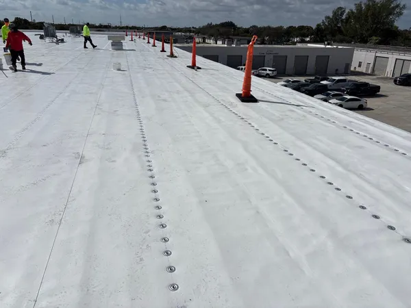 Enhanced roof to wall connectors and fastening for wind mitigation in Palm Beach County